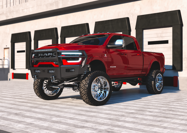 Red 2025 Ram 2500 with a heavy-duty ranch bumper on a custom suspension lift.